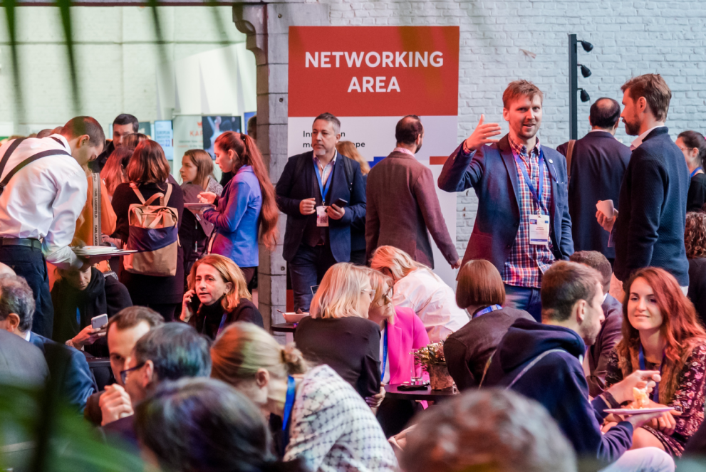 Dozens of attendees at the EIC Summit engaged in lively discussions in the networking area.